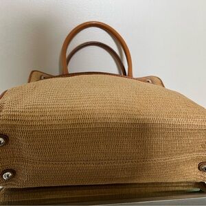 Michael Kors excellent condition tan colored straw double handle shoulder bag.